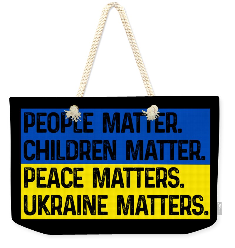 Weekender tote bag with black base and blue-yellow text graphic; natural rope handles
