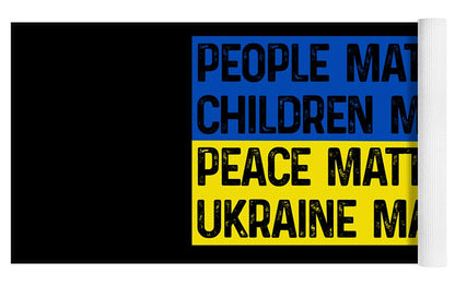 Black yoga mat with rolled edge and partial text: PEOPLE MATTER, CHILDREN M., UKRAINE M.