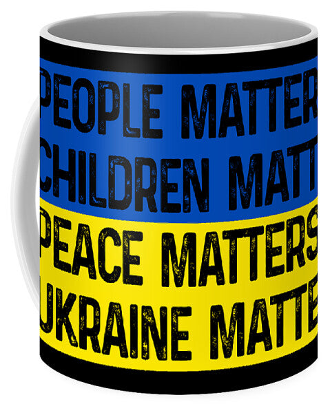 Ukraine Matters printed mug with blue, yellow, and black typographic text