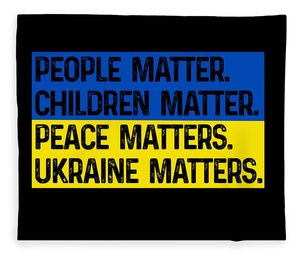 Black blanket with blue and yellow slogan print: PEOPLE MATTER, PEACE MATTERS