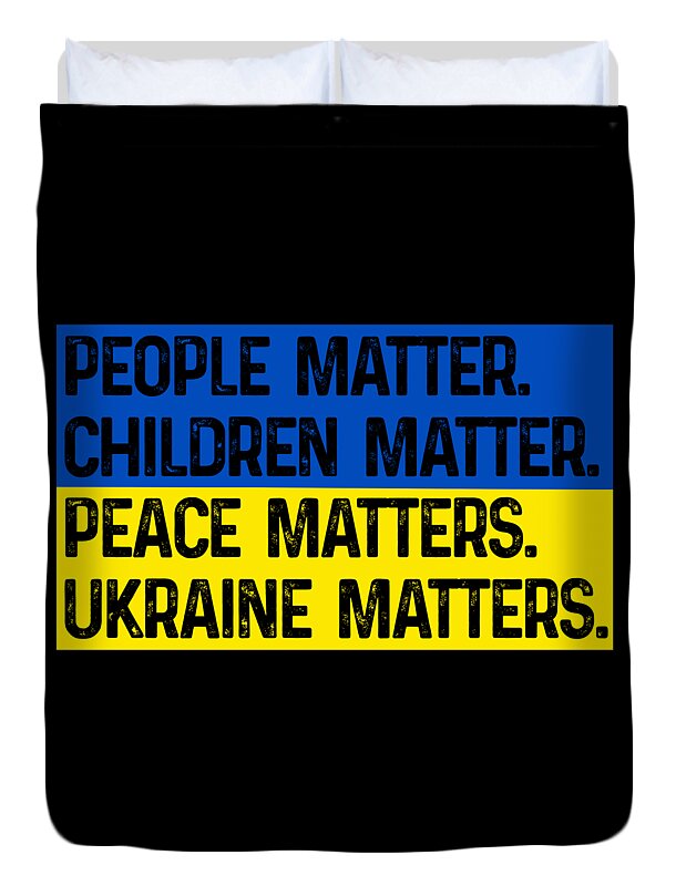 Black duvet cover with large blue and yellow lettering: PEACE MATTERS and UKRAINE MATTERS.