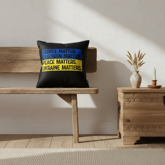 Black throw pillow with text People Matter Children Matter Peace Matters Ukraine Matters