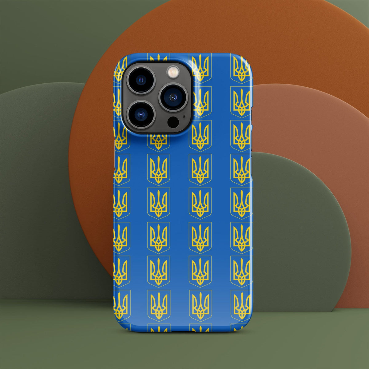 Phone case back view, blue with gold tryzub symbols and camera lens cutouts