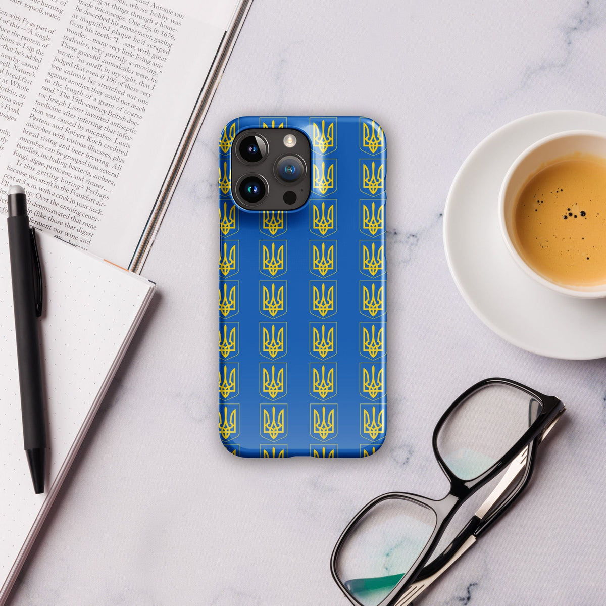 iPhone phone case with blue background and repeating Tryzub trident icons