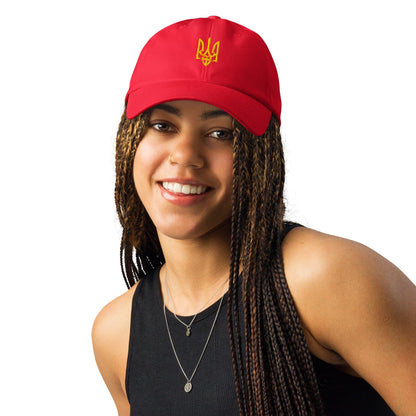 Red Under Armour® cap with yellow Ukrainian trident emblem, front view