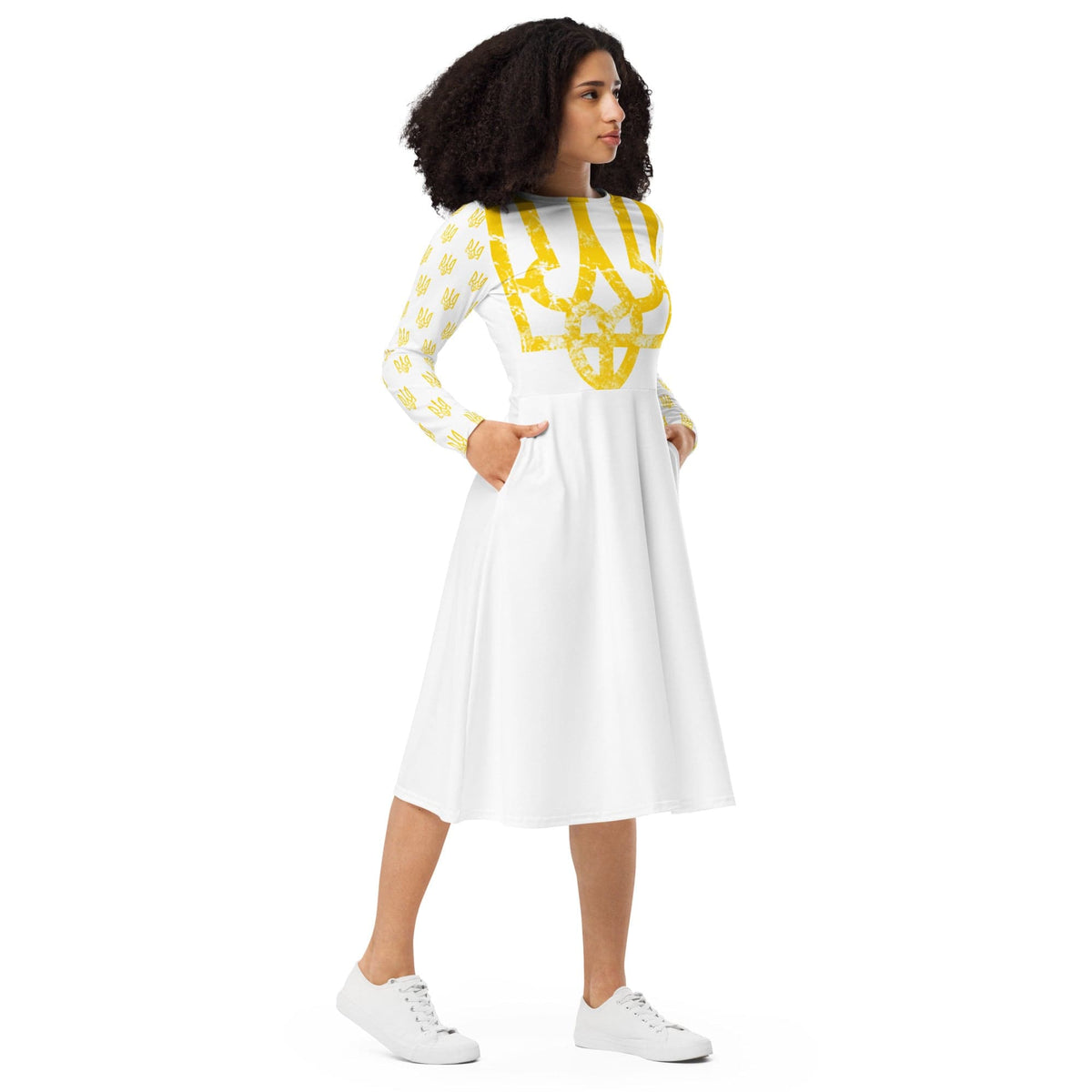 White long-sleeve midi dress with yellow trident print, side view