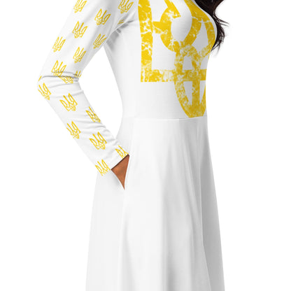 White midi dress with large yellow trident graphic panel and long sleeves