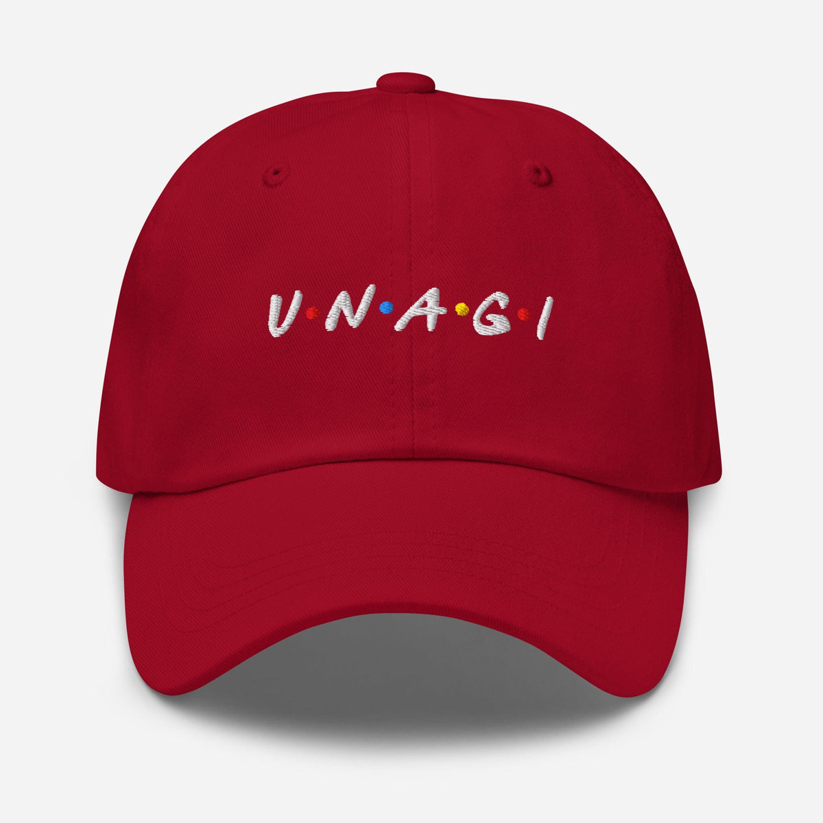 Embroidered baseball cap in cranberry red with curved brim and front logo text