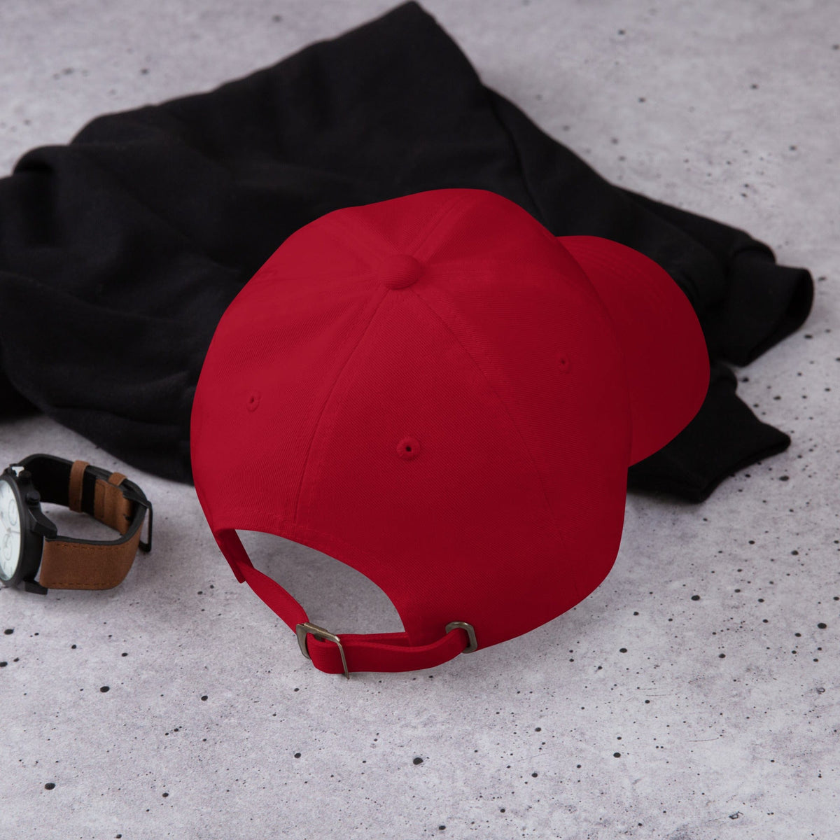Embroidered baseball cap in red, rear view with adjustable strap