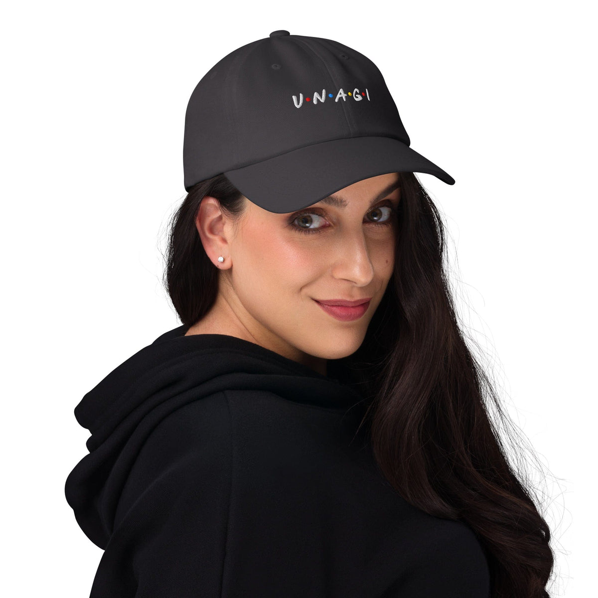 Gray embroidered baseball cap worn by woman, UNAGI logo on front