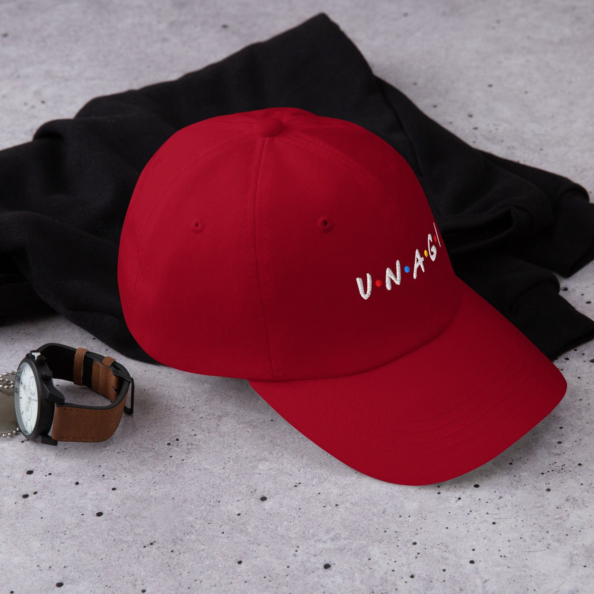 Embroidered baseball cap in red, with front logo text detail