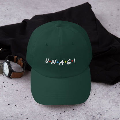 Green embroidered baseball cap with UNAGI logo stitching on front