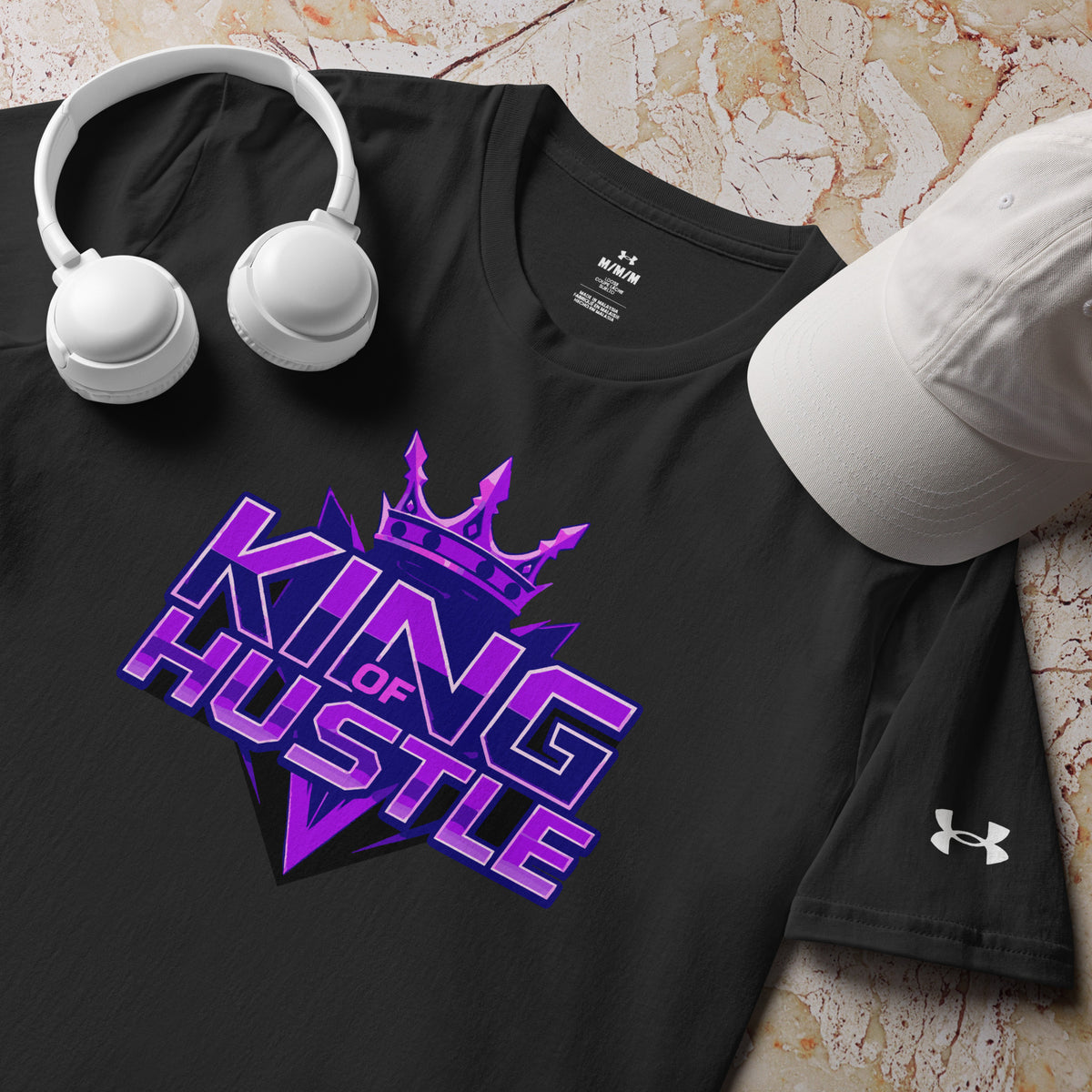 Black athletic T-shirt with purple “King of Hustle” graphic and Under Armour logo