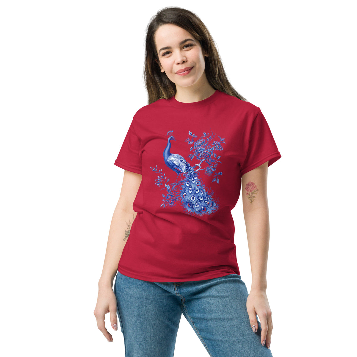 Maroon t-shirt with blue peacock and floral artwork, front view