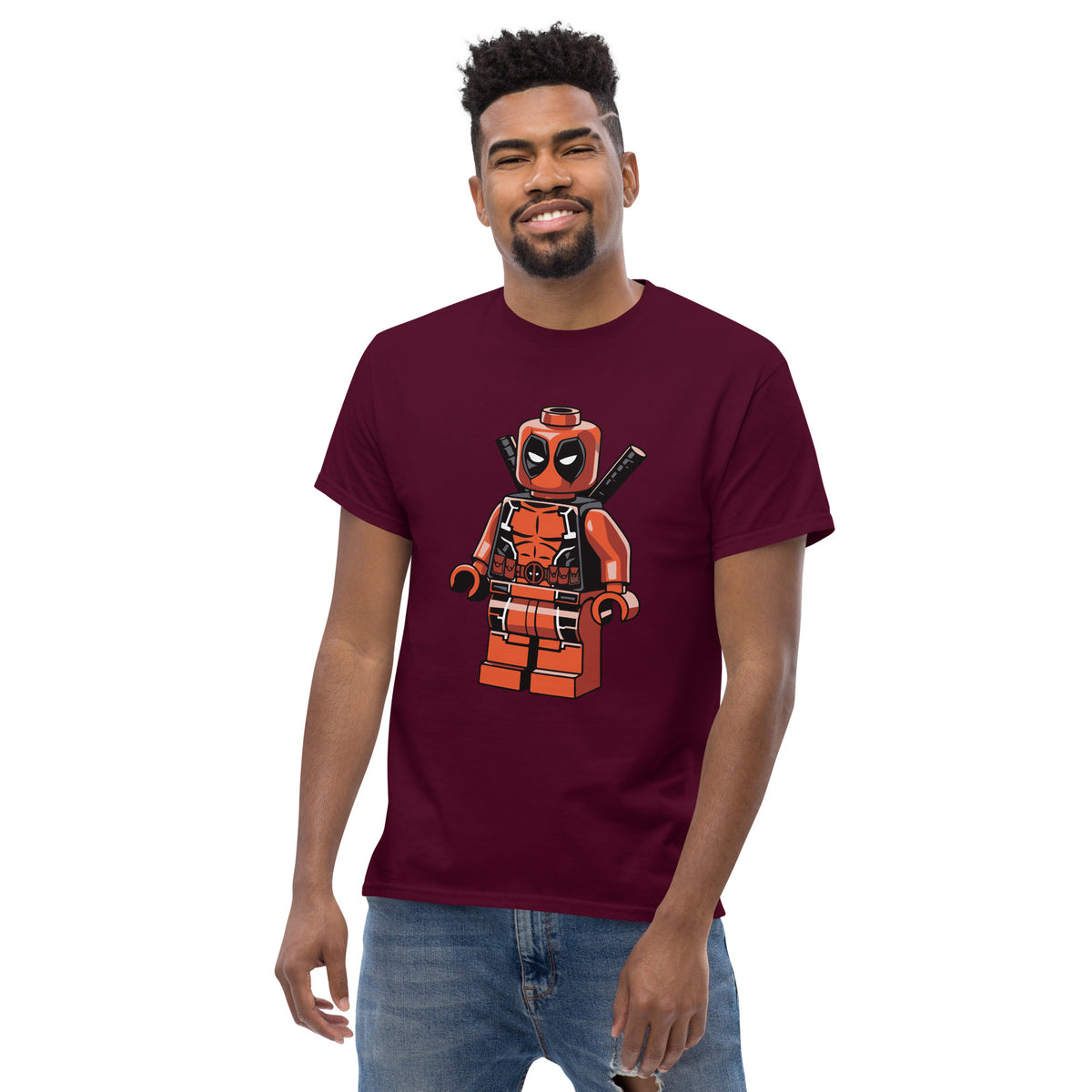 Maroon T-shirt with orange-red block superhero character graphic on front
