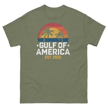 Olive green T-shirt with Gulf of America palm sunset graphic and EST 2025.