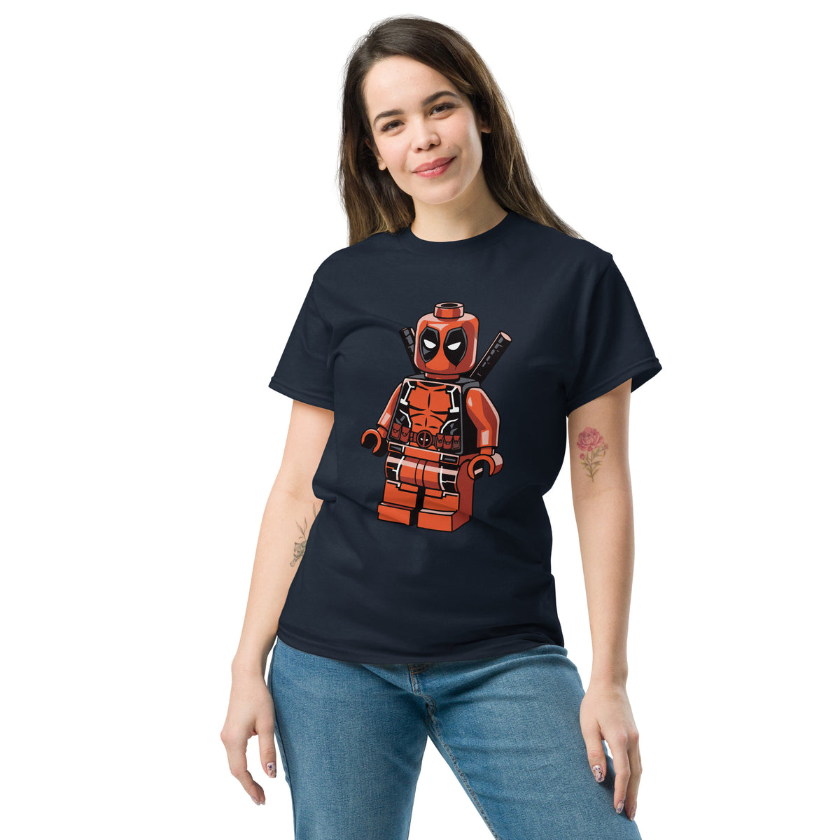 Navy T-shirt with orange-red block superhero character graphic on front