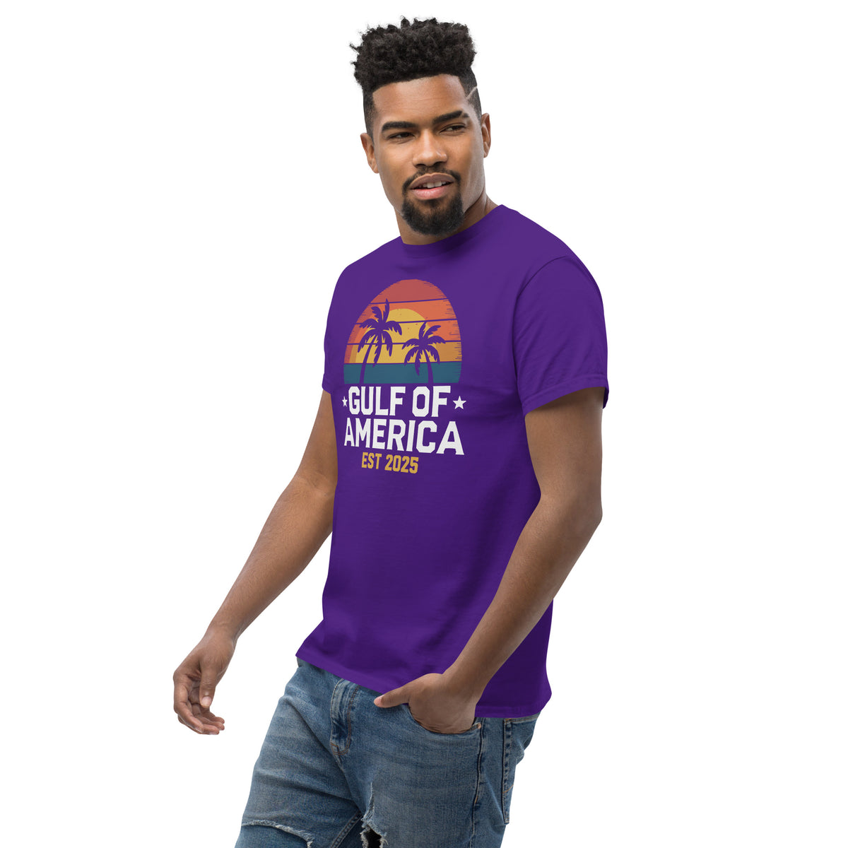 Purple crew-neck T-shirt with sunset palm tree graphic and “GULF OF AMERICA EST 2025” print