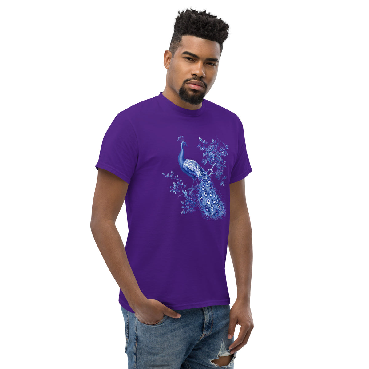 Purple t-shirt with blue peacock and floral artwork on the chest