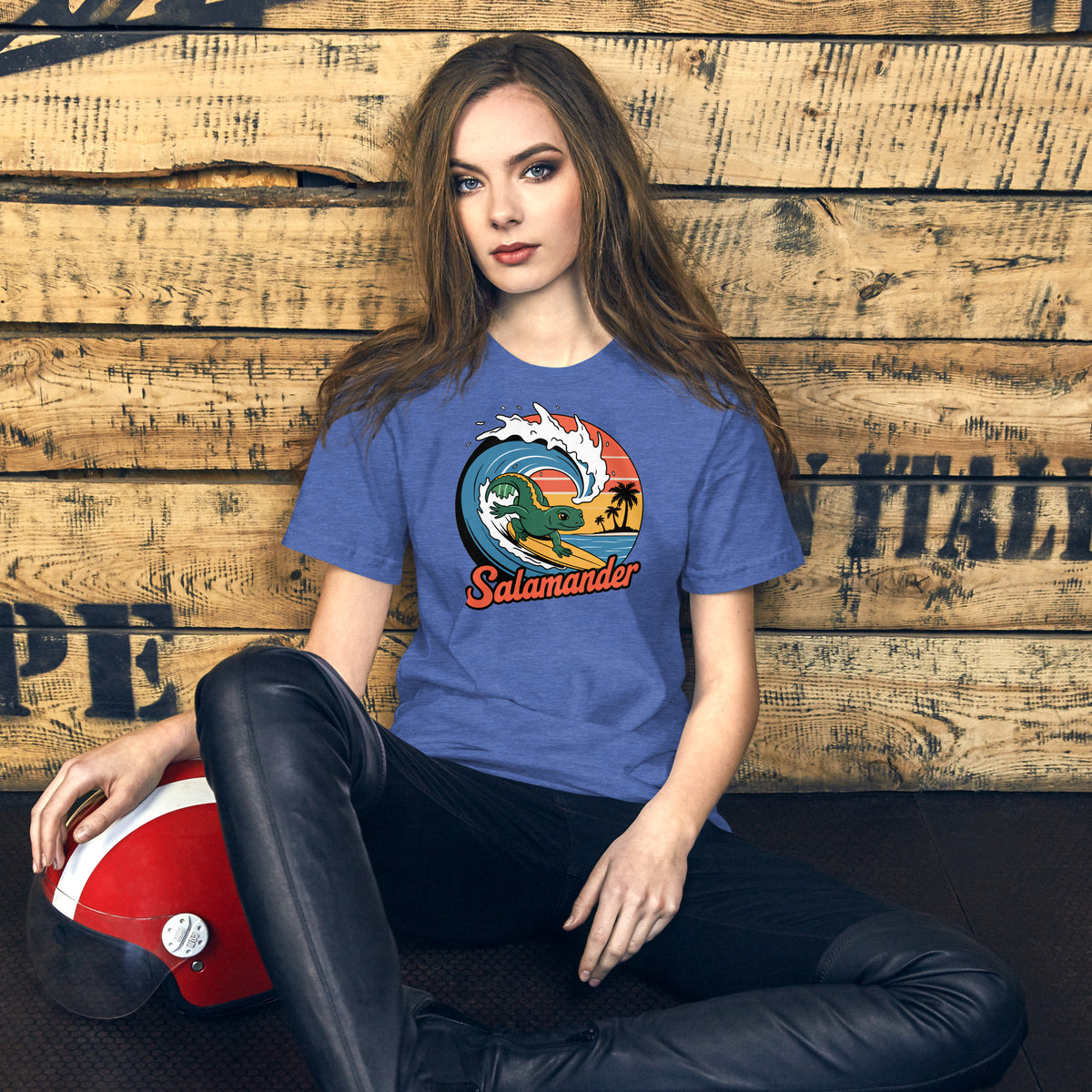 Blue t-shirt with salamander surf wave circle logo graphic on the chest