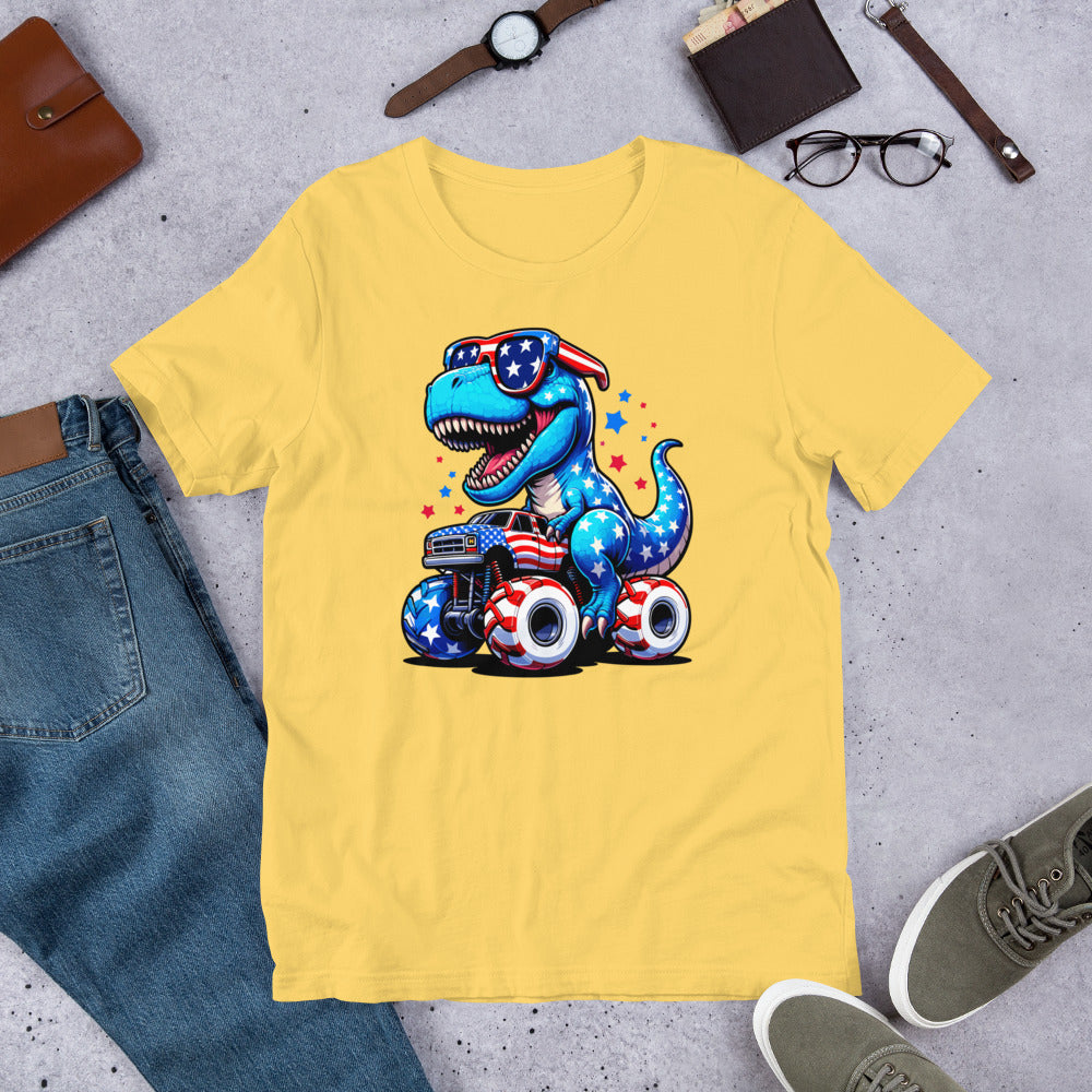 Yellow T-shirt with graphic of a roaring T-rex riding a monster truck