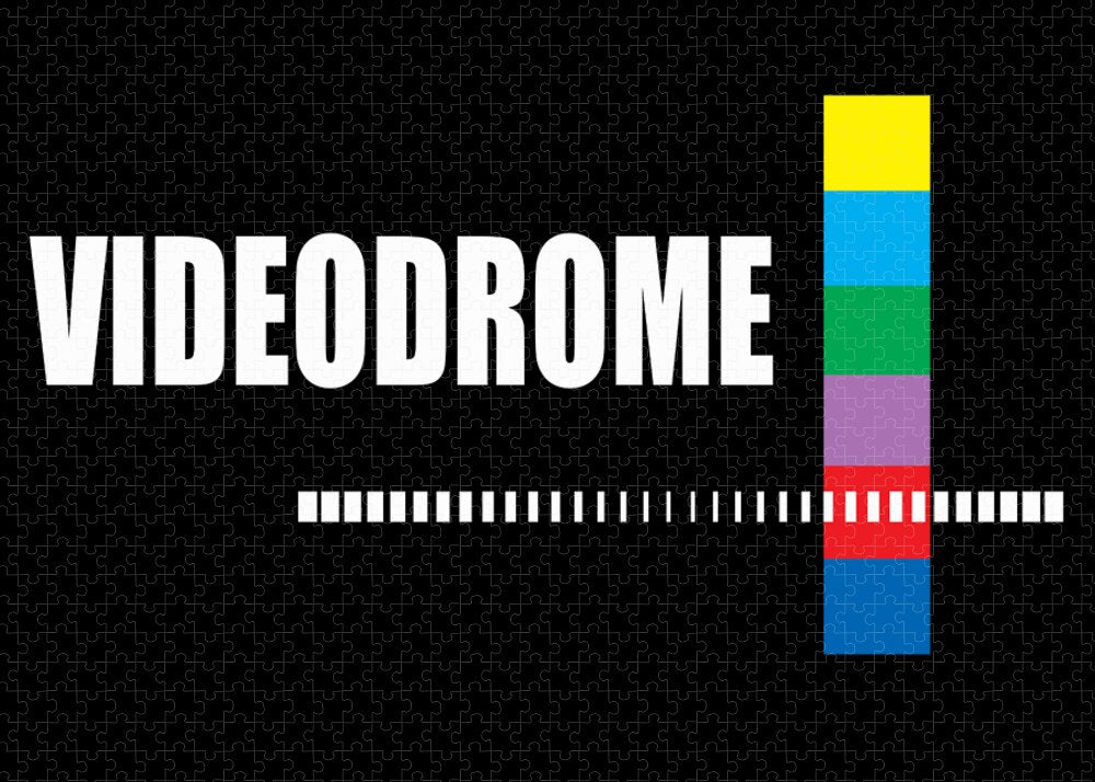Jigsaw puzzle showing “VIDEODROME” text, central barcode stripe, and vertical stacked color bar