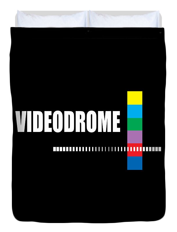 Black duvet cover with VIDEODROME lettering, pixel bar line, and stacked multicolor blocks