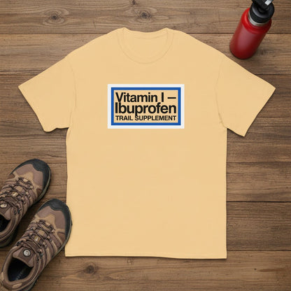 Beige T-shirt with Vitamin I—Ibuprofen Trail Supplement logo on front.