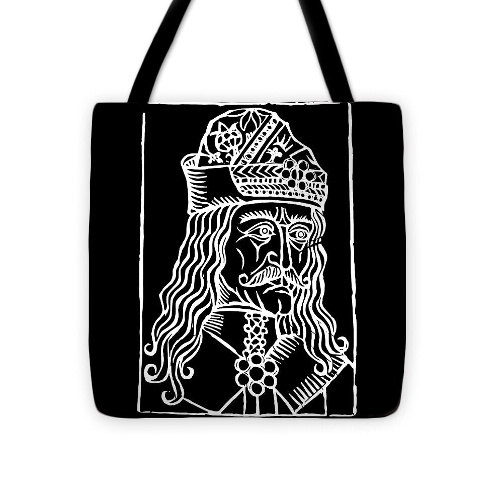Black tote bag with white woodcut portrait and ornate crown details, front panel