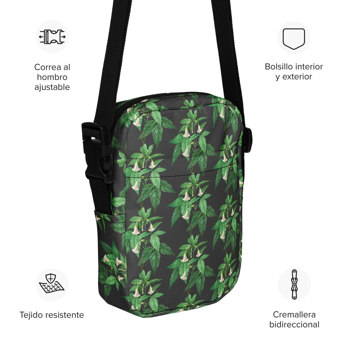 Utility crossbody bag with green leaf-flower print, front zip pocket and interior lining