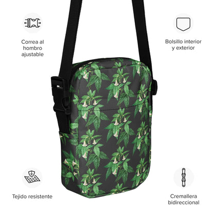 Utility crossbody bag with green leaf-flower print, front zip pocket and interior lining