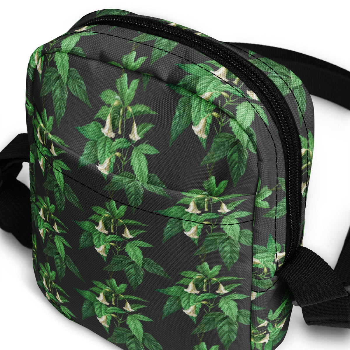 Utility crossbody bag, green floral print, black zipper, adjustable shoulder strap