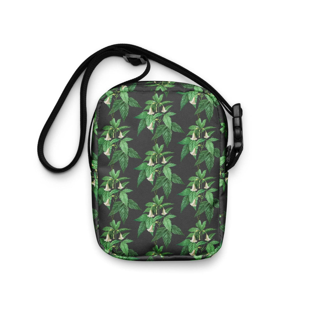 Utility crossbody bag with green leaf floral print, loop handle and black shoulder strap