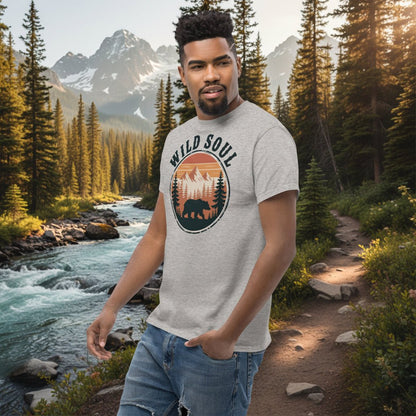 Model wearing heather gray bear camping graphic t-shirt with circular Wild Soul logo