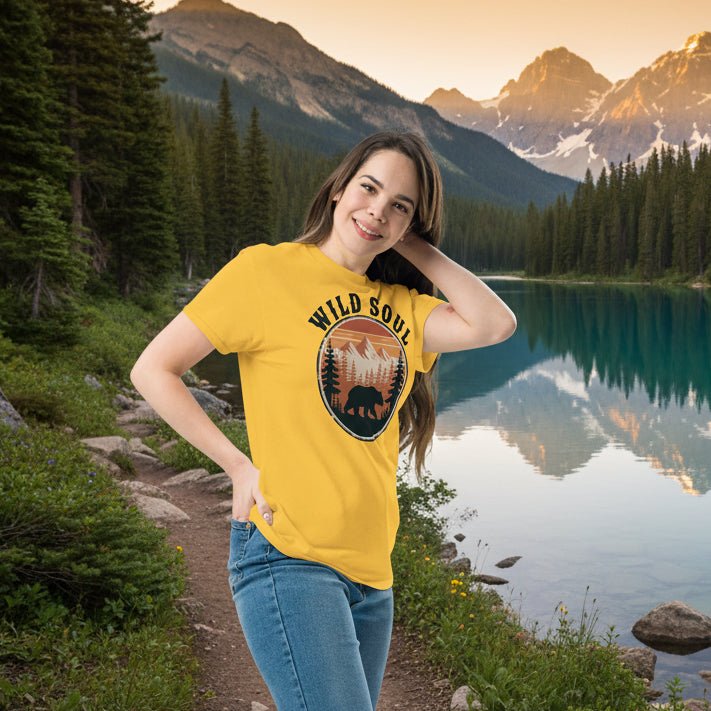 Women's yellow T-shirt with Wild Soul bear camping badge graphic