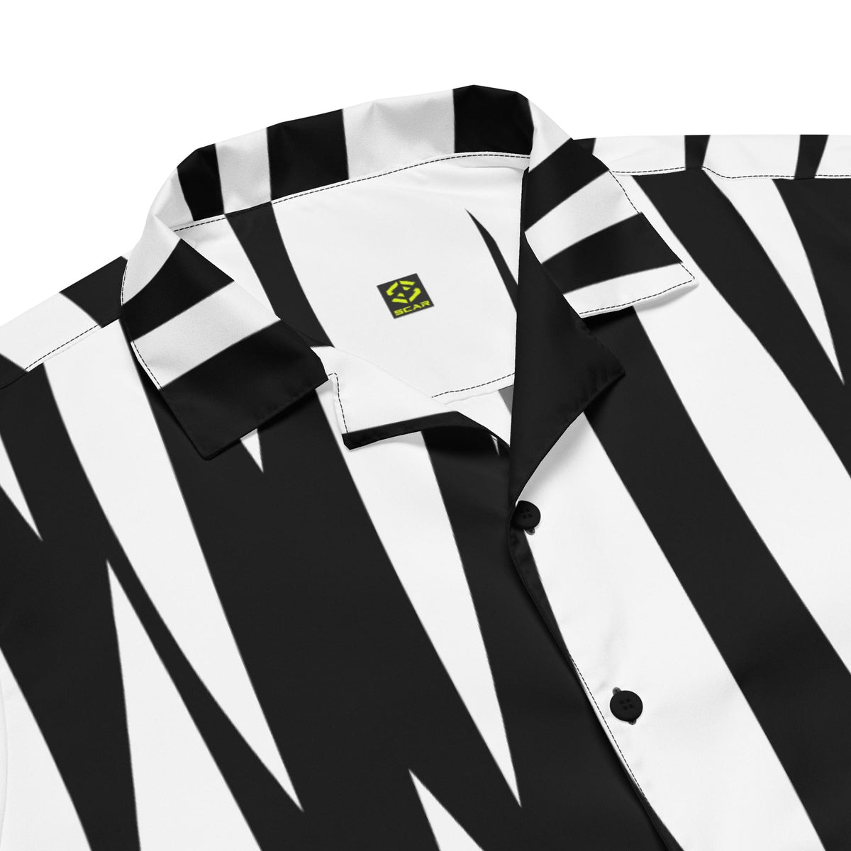 Zebra print button-up shirt showing chest logo and front buttons, black-and-white stripes