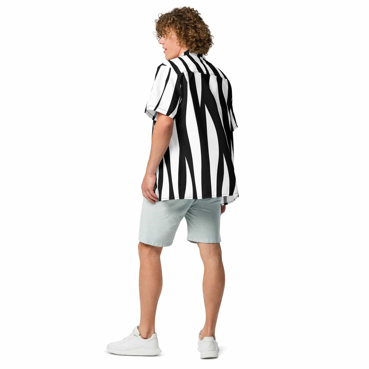 Zebra print button-up shirt with black and white vertical stripes, back view
