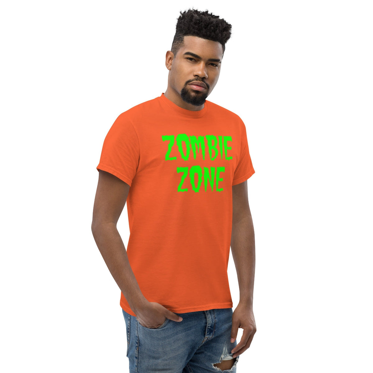 Orange T-shirt with neon green “Zombie Zone” graphic printed at center chest